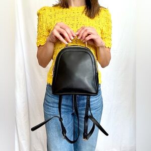 A New Day Sleek Black Faux Leather Backpack Structured Design Tortoise Handle